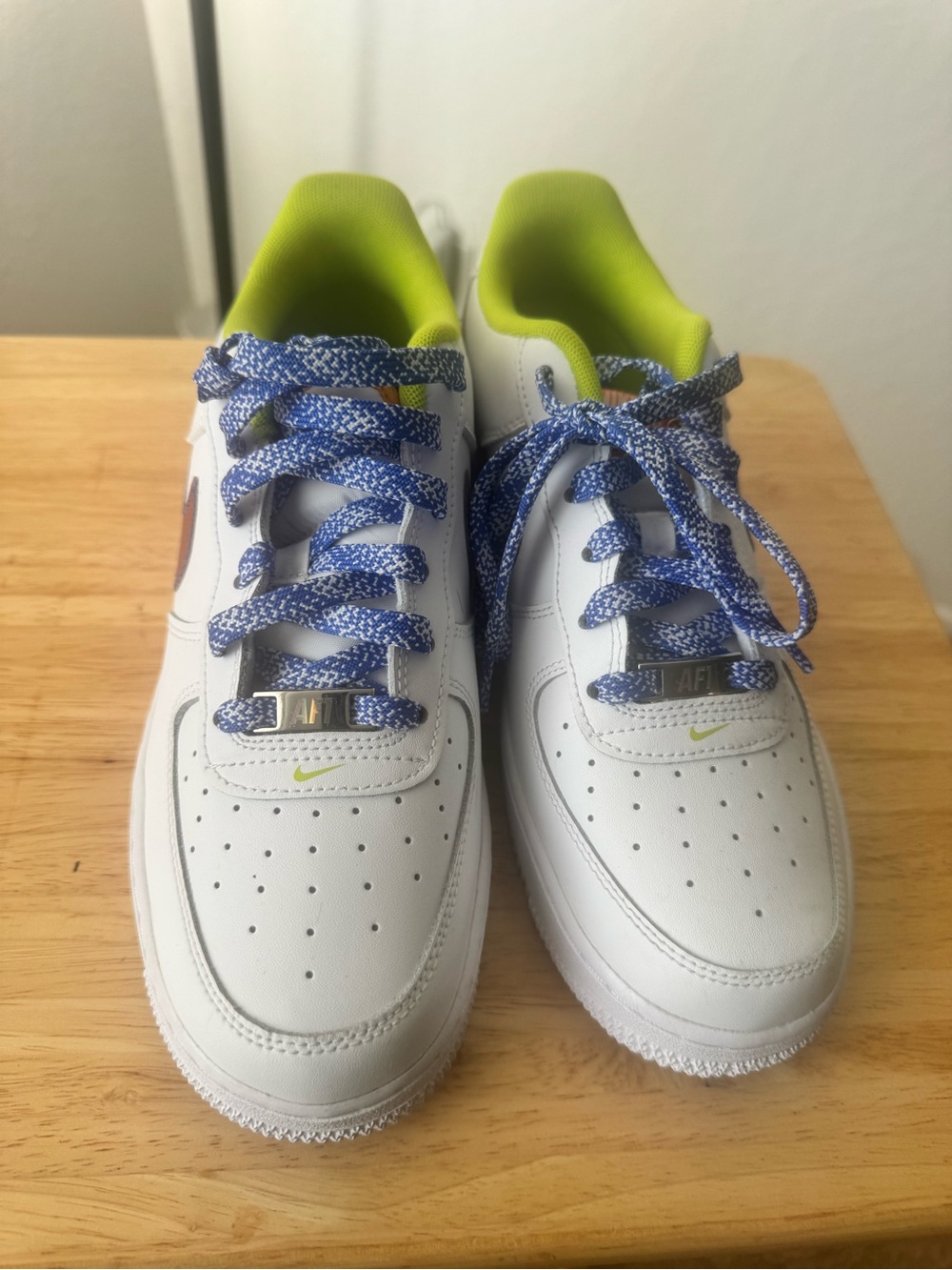 Nike Kids White Sneakers with Lime Inner and Blue Patterned Laces